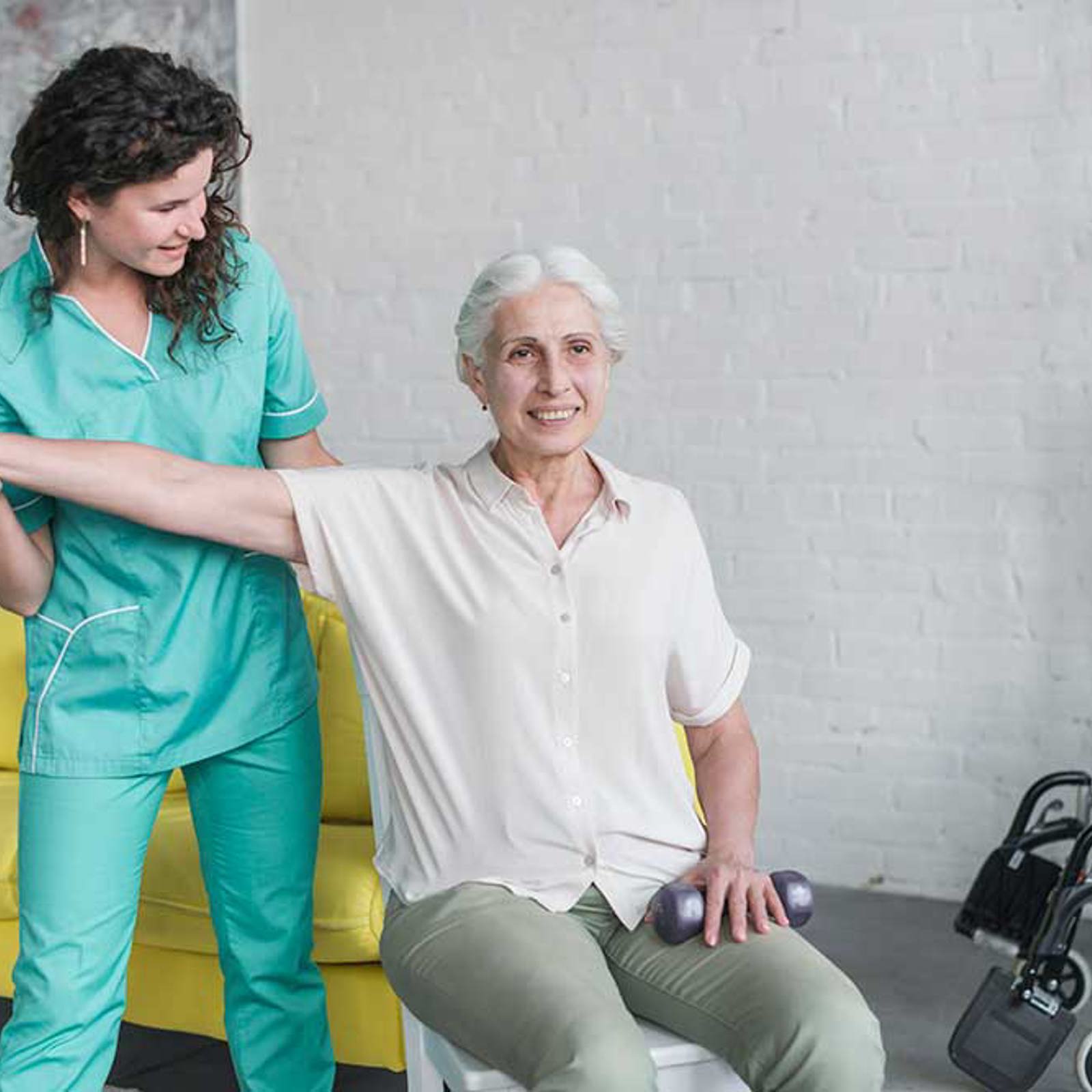 Physiotherapist Working With Patient
