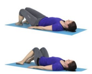 a young woman laying on her back on an exercise mat with knees bent and arms by her side. She keeps her knees together and rolls her legs from side to side keeping the top part of her body static. 